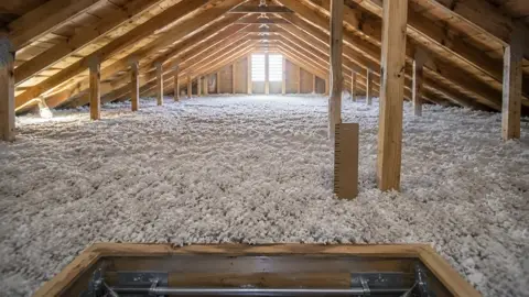 Deep blown-in insulation between attic joists